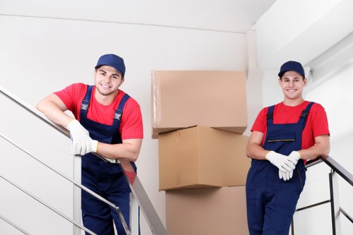Moving van and packed boxes for a flat or house removal in Willesden