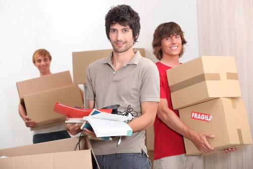 Careful loading of household furniture for a move in northwest London
