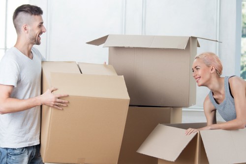 Boxes and furniture arranged for a house removal service in Willesden