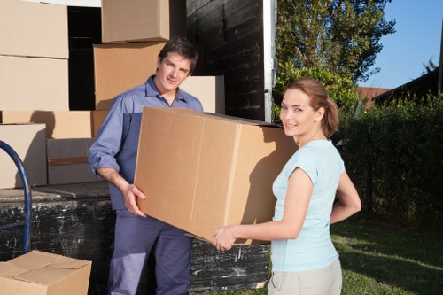 Loading furniture and boxes into a removals van