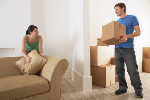 Professional man and van helping with furniture transport in North West London